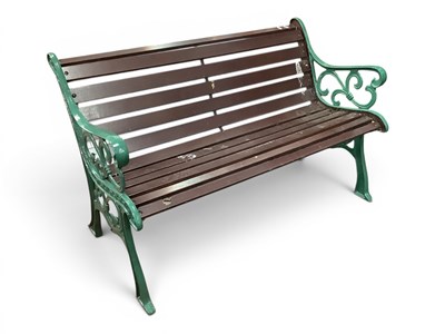 Lot 1464 - A Green Painted Cast-Iron Garden Bench with...