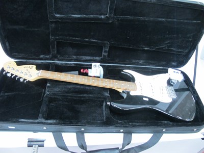Lot 1286 - A Squier Affinity Series Stratocaster electric...