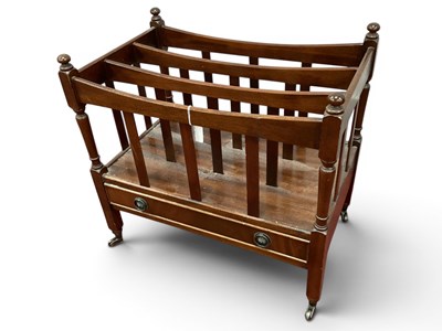 Lot 1565 - A mahogany Canterbury/magazine rack, featuring...