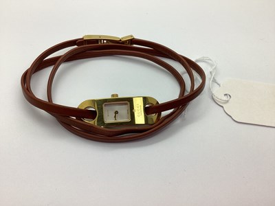 Lot 294 - Gucci; A Ladies Wraparound Style Wristwatch,...