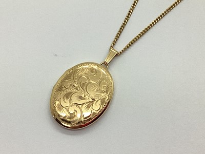 Lot 115 - A 9ct Gold Oval Locket, of floral textured...