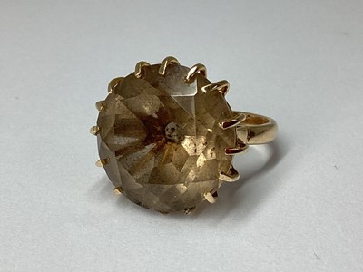 Lot 53 - A Large Stone Set Ring, high circular claw set...