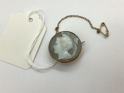 Lot 95 - A Circular Carved Hardstone Cameo Brooch,...