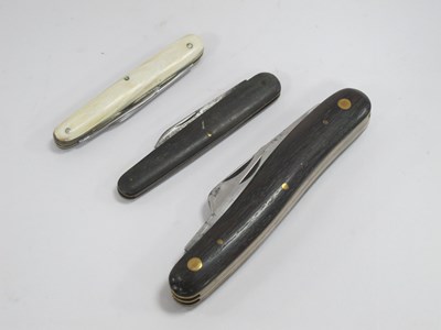 Lot 1228 - I.XL Wostenholm Three Blade Knife, brass...