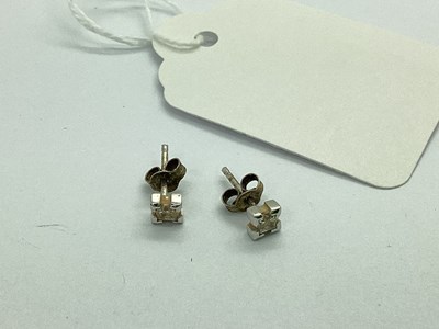 Lot 144 - A Pair of 18ct White Gold Dainty Single Stone...
