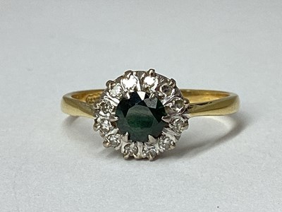 Lot 15 - An 18ct Gold Dainty Cluster Ring, claw and...