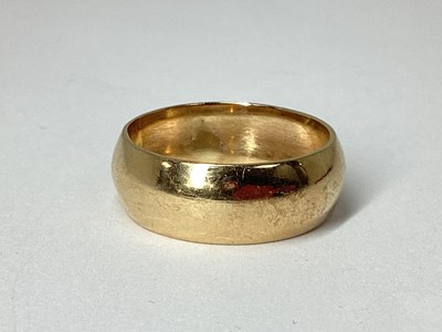 Lot 16 - A Wide Plain Wedding Band, (finger size Q).