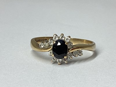 Lot 18 - A 9ct Gold Cluster Dress Ring, oval claw set...