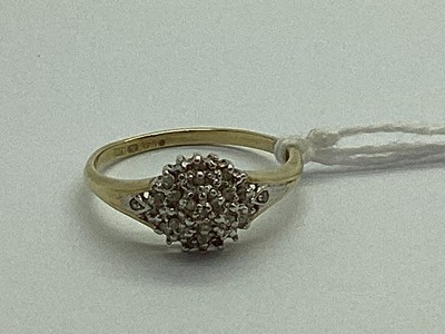 Lot 35 - A Modern Dainty Diamond Set Cluster Ring, claw...