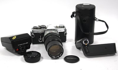 Lot 1067 - Olympus collection, including silver body OM-2...