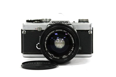 Lot 1060 - Olympus OM-1N silver body SLR camera with...