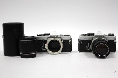 Lot 1063 - Olympus OM-2N SLR camera with cased E.Zuiko...