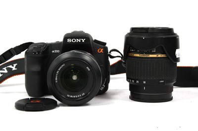 Lot 1064 - Sony Alpha A200 DSLR Camera with attached Sony...