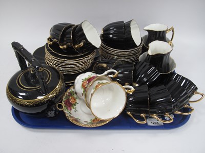 Lot 1295 - Old Royal Black & Gilt Teaware, of forty-one...