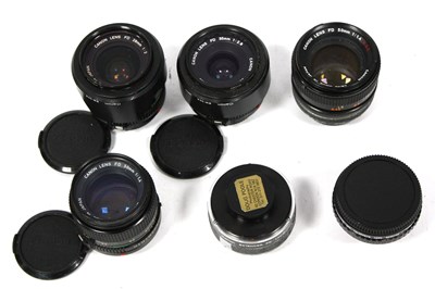 Lot 1045 - A quantity of Canon FD Lenses to include Canon...