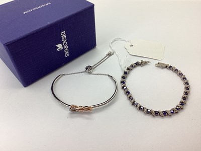Lot 148 - A Decorative Modern Line Bracelet, alternately...
