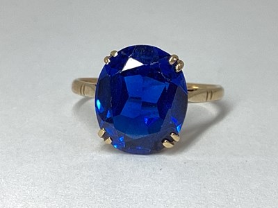 Lot 60 - A Single Stone Dress Ring, oval double claw...
