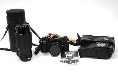 Lot 1001 - Canon A-1 35mm SLR Film Camera with attached...