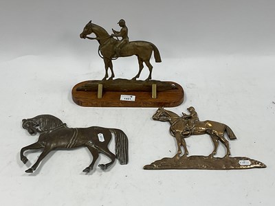 Lot 1451 - Three Brass Equestrian Doorstop Figures, one...