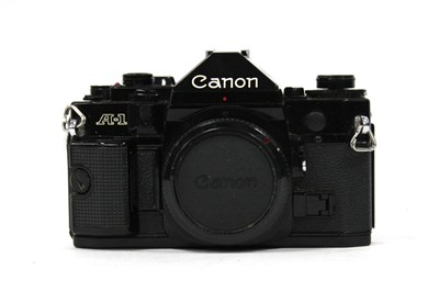 Lot 1033 - Canon A-1 35mm SLR Camera Body, black, Untested.