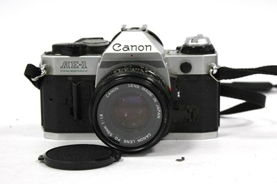 Lot 1035 - Canon AE-1 Program 35mm SLR Film Camera with...