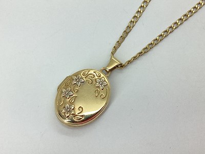Lot 103 - A 9ct Gold Oval Bi-Colour Locket, of floral...