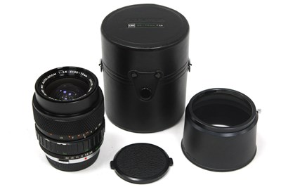 Lot 1148 - Olympus Zuiko MC 35-70mm f/3.6 Lens, cased...