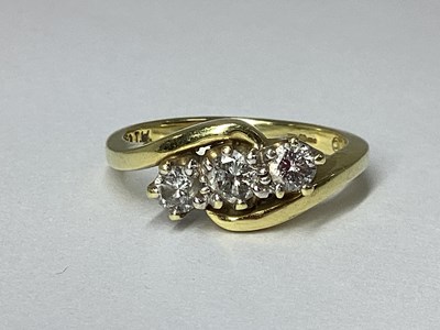 Lot 47 - An 18ct Gold Three Stone Diamond Ring, claw...