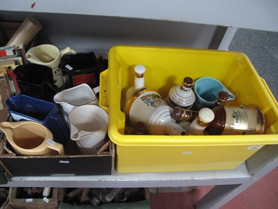Lot 1204 - Ceramic decanters and jugs, including quantity...