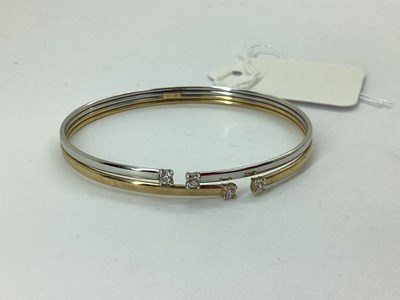 Lot 94 - A Hollow 9ct Gold Bi-Colour Bangle, with four...