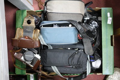 Lot 1102 - A large collection of 35mm SLR Film Cameras to...