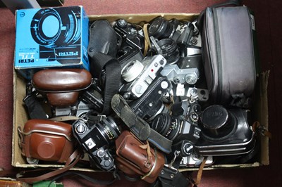 Lot 1105 - A large collection of 35mm SLR Film Cameras to...