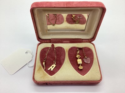Lot 122 - A Novelty Hollow Sweet in Wrapper Charm,...