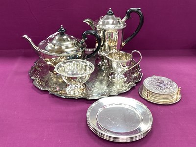 Lot 253 - A Plated Four Piece Tea Set, on decorative...