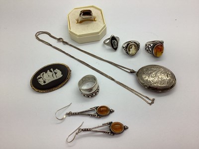 Lot 141 - A Hallmarked Silver Oval Locket Pendant, on...