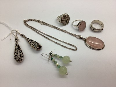 Lot 140 - Rose Quartz Oval Panel Pendant, on a chain;...