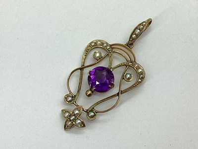 Lot 84 - An Edwardian Openwork Pendant, circular claw...