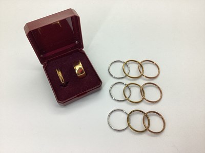 Lot 113 - A Plain Wide Wedding Band, stamped "ROLLED...