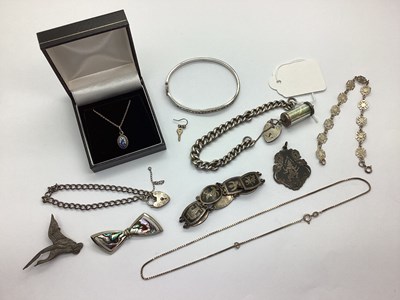 Lot 116 - A Graduated Curb Link Bracelet, to safety...
