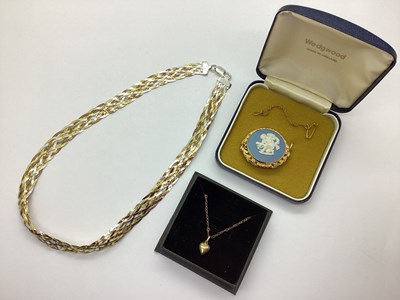 Lot 139 - Wedgwood; A Circular Blue Jasperware Brooch,...