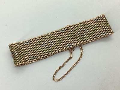 Lot 153 - A 14ct Three Colour Gold Wide Bracelet, with...