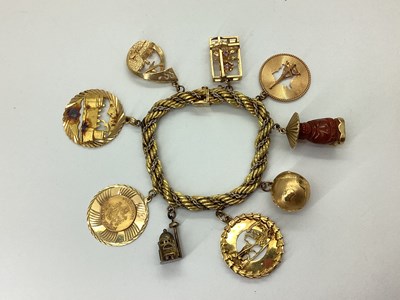 Lot 174 - A Fancy Link Two Colour Hollow Ropetwist Charm...