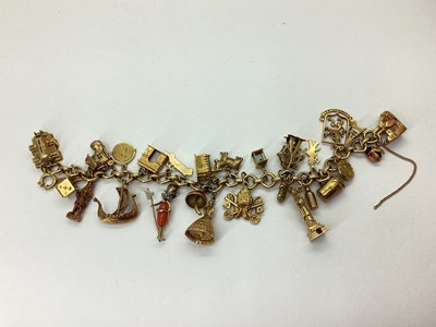 Lot 162 - A Fancy Link Charm Bracelet, (indistinctly...