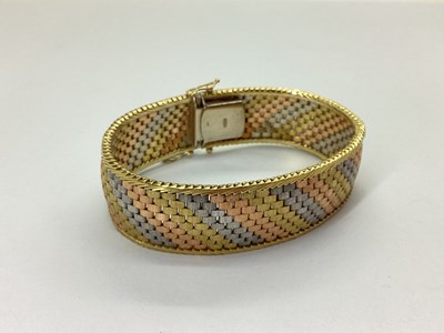 Lot 169 - A 9ct Three Colour Gold Wide Bracelet, of...