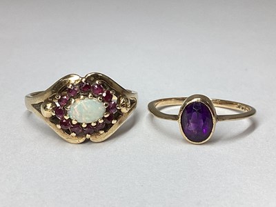 Lot 209 - A 9ct Gold Opal Set Cluster Dress Ring, oval...