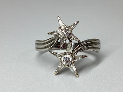 Lot 192 - A Modern Diamond Set Double Star Dress Ring,...