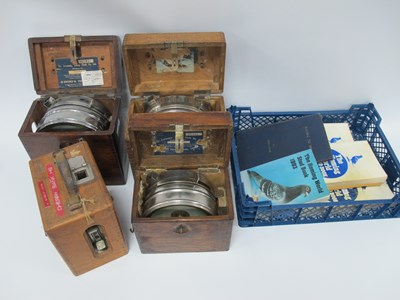 Lot 1366 - Four Cased Pidgeon Racing Clocks (The...