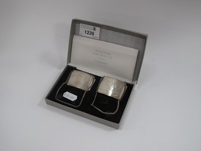 Lot 1239 - Concorde - Two hallmarked silver spirit labels...