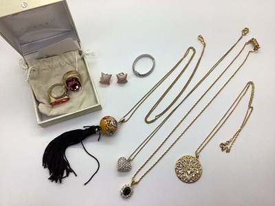Lot 117 - Aurora; Two Chunky Gilt Coloured Single Stone...