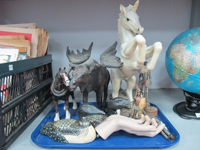Lot 1378 - Leather? Covered Moose, 29cm high two metal...